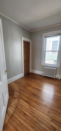 Bedroom - 1st floor laundry and parking include all hardwood floor appliances included Apartments
