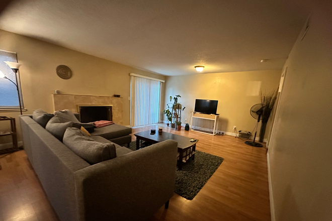 Living Room - spacious private bedroom in a 5 bdrm, 3 bath house with a pool, walking distance to ucr