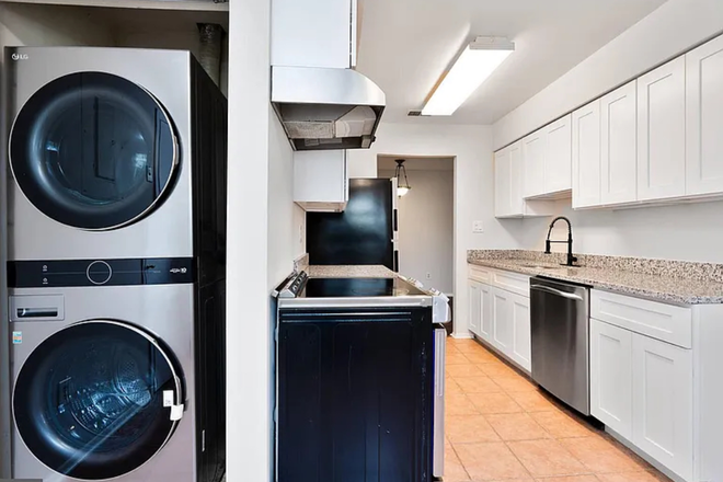Kitchen with washer and dryer - Spacious bedroom in a 2Br unit available for rent, family friendly neighborhood Condo