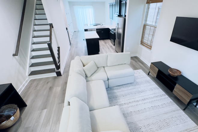 Living room - New Construction townhome right Outside of College Park