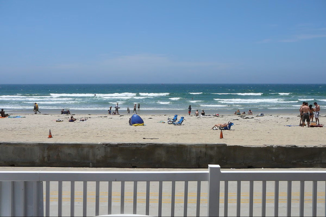 Actually what you get. - Beach Front Condo - ELEVATED 200sqft PRIVATE DECK! Sleeps 4. BBQ, Internet, Garage, Paid Utilities