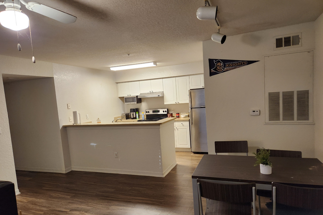 Kitchen/Dining Room - Village at Science Drive, Right Near Campus Apartments