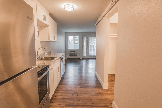 Kitchen Looking at Main Room - The Lodge Apartments