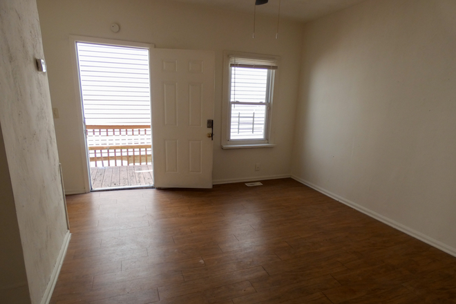 Living Room - ODUrent Offers 1405 W 42nd St House