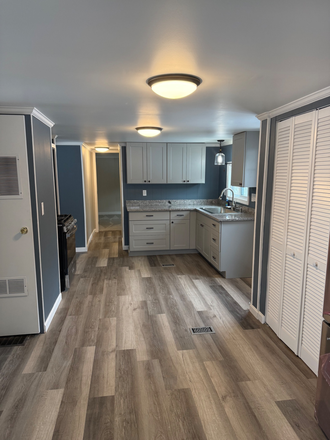 12 - Three bedroom one and a half bath House