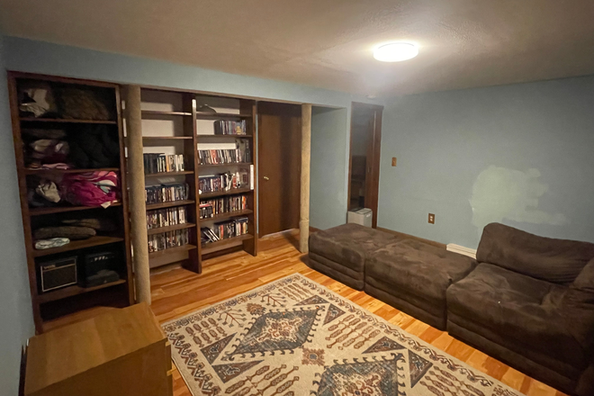 Living Room - Room with private bath and living room (shared kitchen).  Two miles from town. Convenient to bus House