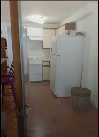 Living Room / Kitchen - 1 Bedroom plus Den  - near AU and GU Townhome