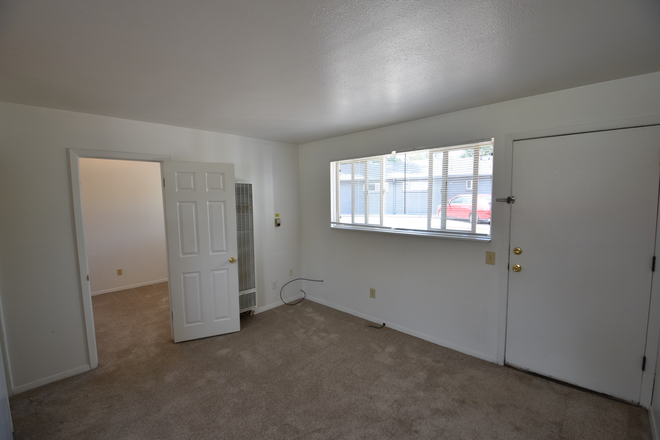Living Room - 2985 E. College Ave. (1BR/1BA) Apartments