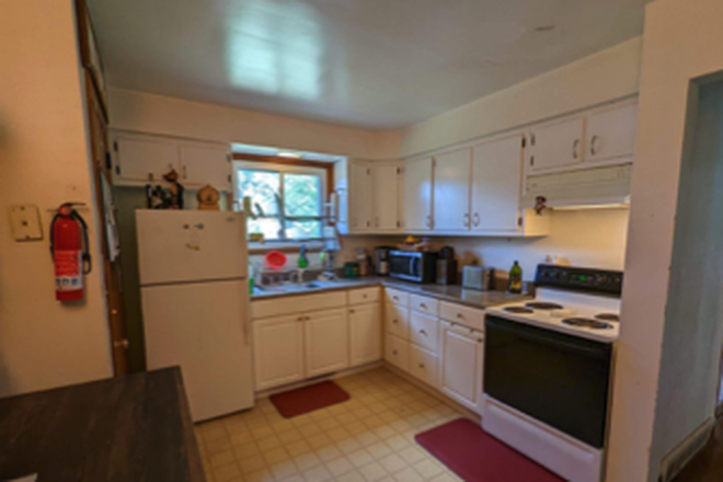 Kitchen - Sublet entire unit - 2BR, 1BA, basement, shared lawn, parking space. Furnished with washer and dryer House