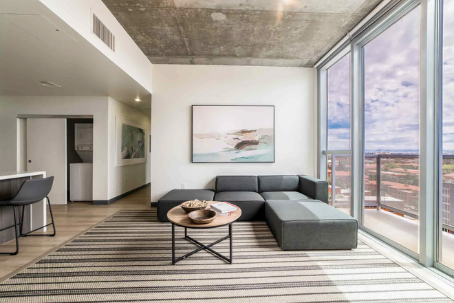 The living room. This is an image from The Pacific website to show the exact layout. This photo is not of my actual unit. - The Pacific Apartments