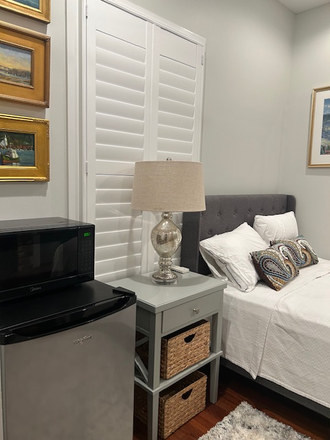 Small refigerator, microwave and Smart TV ensuite. - Eastside Elegance. Spacious yard. BigBadBreakfast, Taco Boy, Leons, Melfis, East City Lights Coffee House