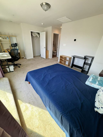 Bedroom - 4th floor bedroom with bath Furnished 2 car garage townhome in GREENBELT