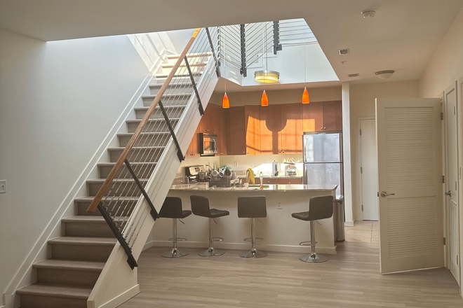 Living room and kitchen - Village Lofts Penthouse + Roof Deck