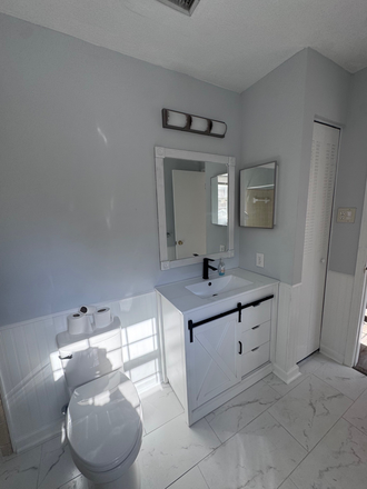 Renovated master bathroom with new toilet and vanity - Spacious bright beautiful clean condo with gas and water included