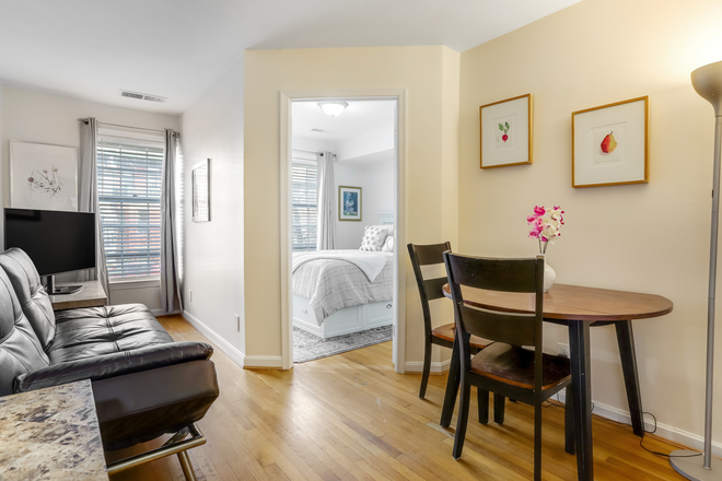 Living Room - A Cozy Delight in Dupont Circle 1 bed, 1 bath Apartments