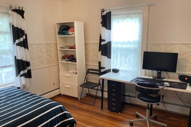 double bed with desk, chairs shelving and storage - Furnished bedroom in a quiet home for female on Hope street.