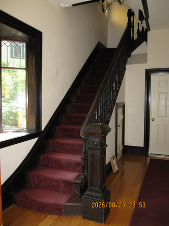 Staircase in entry lobby of property - Top Floor Two Bedroom with Parking and Roof Deck - Steps to Harvard Apartments