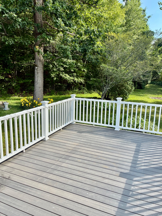 Deck - Escape to a peaceful, private setting in a beautiful 3 bdrm home close to UMass on 7 scenic acres