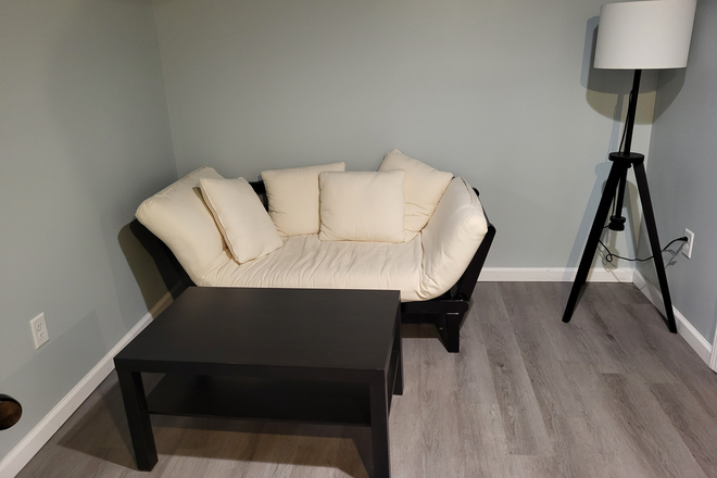 Living area - Furnished basement apartment with kitchenette