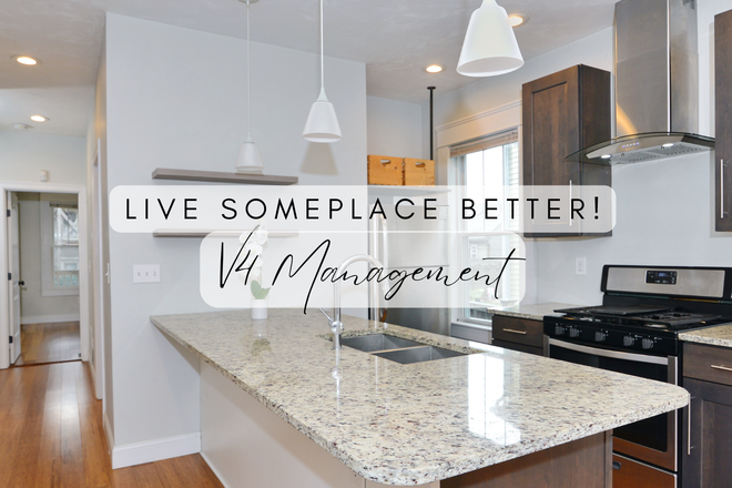 V4 Management - Amazing East Side location- in unit laundry, private deck, central AC Apartments