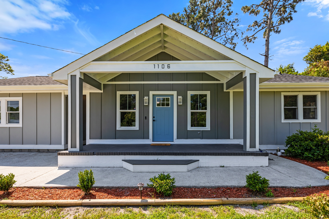 Front of home w/ Security and cameras - Brand New Beautiful Home 5 miles from Campus