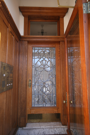 Front door of building - 2939 N Charles- MULTIPLE 1bedroom Units, furnished & unfurnished sunny and close to campus, August Apartments