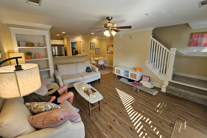 Family room with kitchen behind the bar - The Woodlands