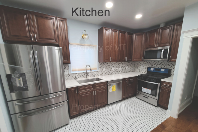 kitchen - Recently renovated 3-bed 1.5-bath w/ in-unit laundry for $4,200 Triplex