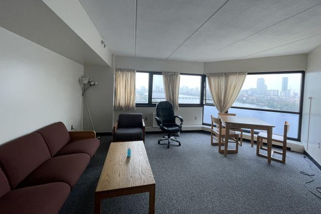 Spacious Living Room - 20th-floor River-facing Apartment in 550 Memorial Drive for Winter Sublet Dec-Feb