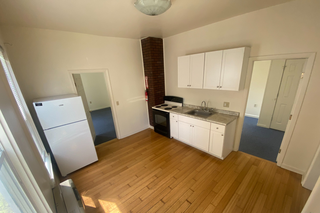 Kitchen from the front door - Bright Downtown 3-Bedroom near Battery Park | Available Now