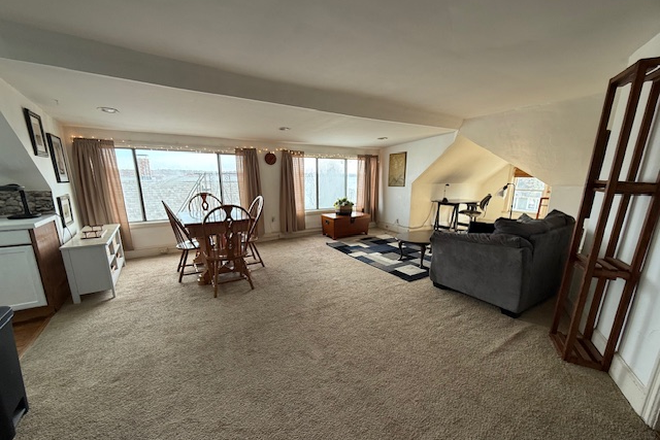 living room 16' of windows, dining room table, 4 chairs, - Cranston Waterview 1 bedroom available Jan 1st.  Beautiful view Triplex