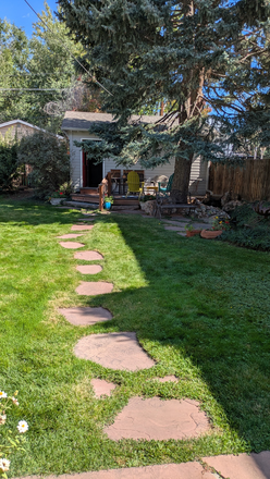 Backyard, deck and garage - Garden Level furnished studio Apartment with private bath in occupied single family home + garage