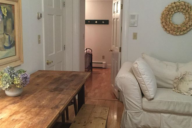 view from dining /tv area back to bedroom - NEW! RARELY listed, 2 story furnished condo in Harvard Square home, all utilities