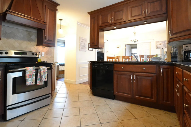 Kitchen - 70 Hobart St Apt #1, spacious apartment, a back porch for events, laundry in-house