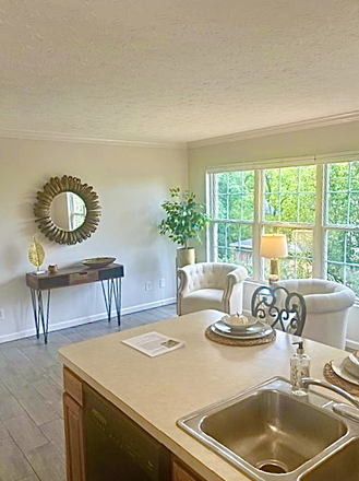 Living Room Area when it was Furnished; Not Currently Furnished - Spacious Townhome Near UC, Hospitals, FC Stadium, Dining, OTR and Downtown - Available Immediately