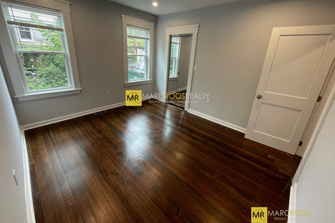 Living Space - Raymond Ave 4 Bed Somerville Apartments