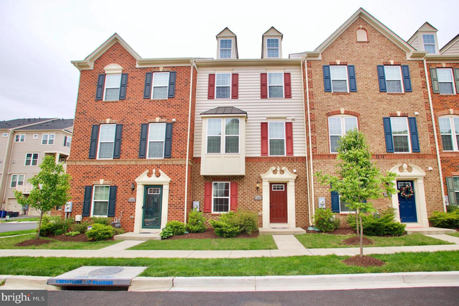 exterior front - Furnished 4 level 5 bedrooms 4.5 bath 2 car garage townhome in GREENBELT STATION
