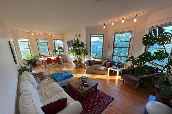 Living/Dining Area - Seeking Fourth Roommate for Sunny 3rd-Floor Unit in Inman Square Apartments