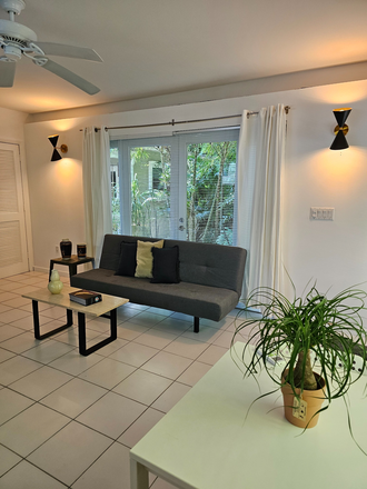 white modern interiors - 1.2 mls to UM avail 7/8/25 coconut grove garden studio apt. private entrance. furnished
