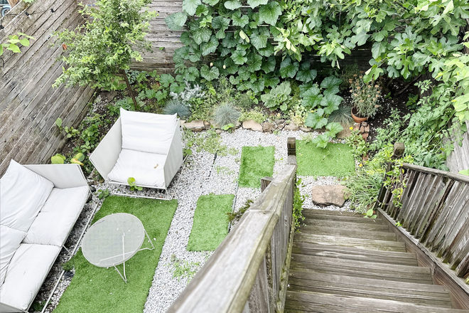 back yard - Brooklyn 3-bed 2-bath with Backyard! Townhome