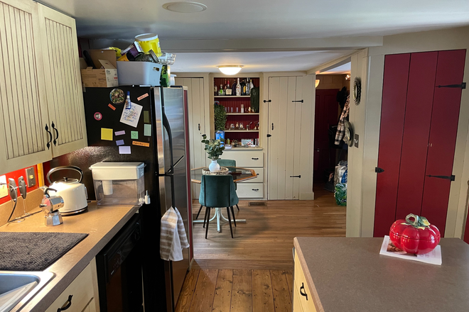 kitchen into dining - Comfortable home in historic village near campus