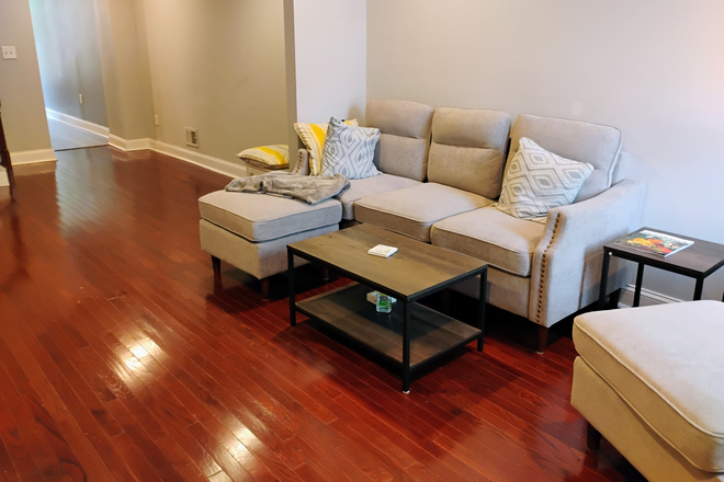 Living Room - Two bedrooms available in a cozy three bed / three bath row home in Canton!
