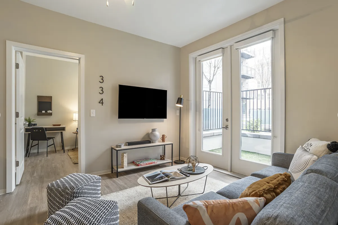 similiar living room setup but not exactly, also does not have balcony area - one bedroom unit in the uncommon auburn.  great location, see uncommon auburn for more details!