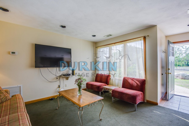 Living Room - Newly Renovated!!! Durkin Complex Duplex with Covered Patio Duplex