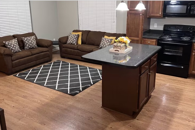 Living Area - Modern Furnished 3BR/3BA Near FAMU, FSU & TCC