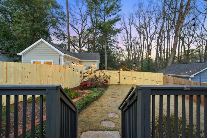 Private fenced yard and walkway leading to guest house - Private Furnished Entire Home | Near Emory & CDC | Utilities Included