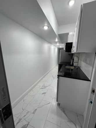 Basement Kitchen - 3825 Lancaster Avenue (New Construction) Apartments