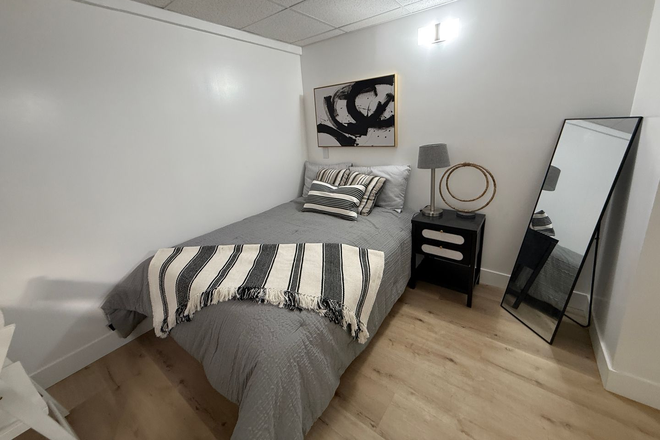 Bedroom - Elevated Modern Living - Furnished Renovated Prime Downtown/South Temple / Close to U Apartments
