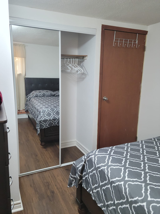 Bedroom - Furnished 1 bedroom basement apart with walk out entrance.Access to free Laundry 3 days per week. House