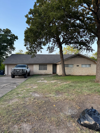 Front of the house. - East of campus house